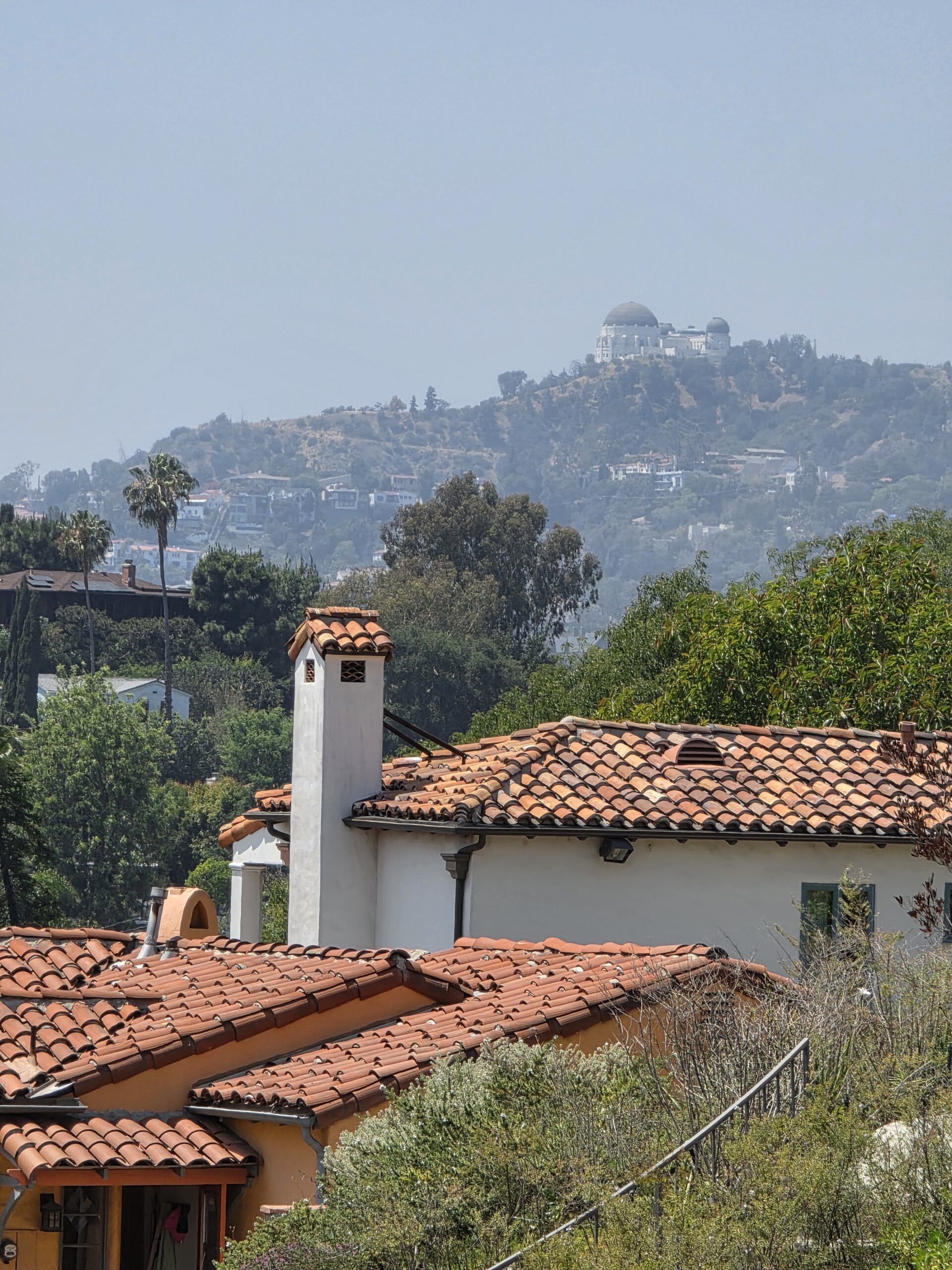 Griffith Observatory in the background from terracotta rooftops in Silver Lake